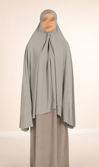 sagegroene jersey khimar met lange draperende kap en vouwen bij de hals