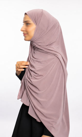 Prem. jersey sjaal, langwerpig, mauve roze, drapering rondom het hoofd gedragen.