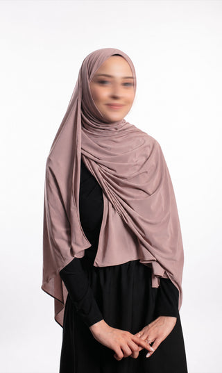 Prem. jersey sjaal, langwerpig, mauve, geknoopt draperend over schouders en rug.