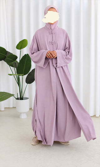 Nakaizu co-ord set in lila met knoopdetail en wijde pijpen, lange mouwen.